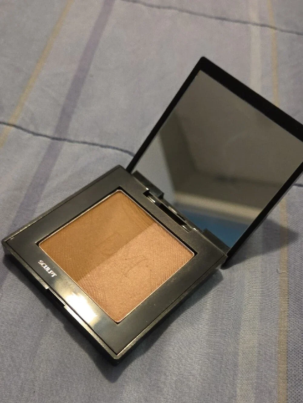 laura mercier glossy black